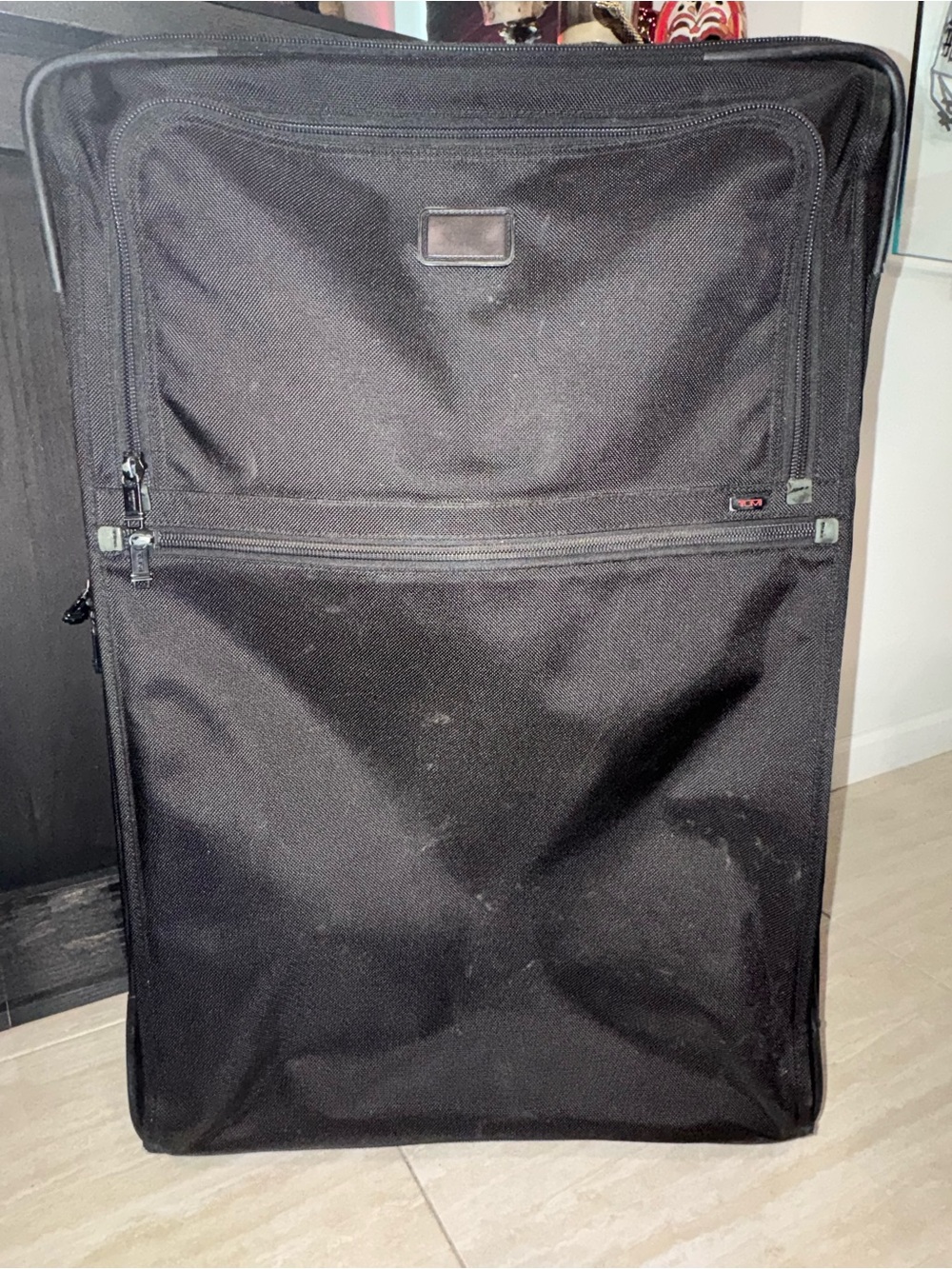Tumi Black Large Rolling Duffel with Front Zip Pocket